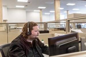 Remote support employee assisting MSP client